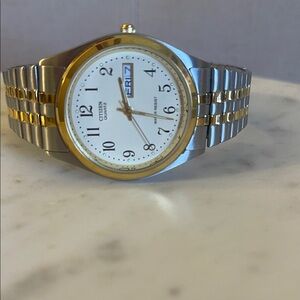 Preowned like New Condition Two-Tone Silver & Gold Watch with Stretch Bracelet.